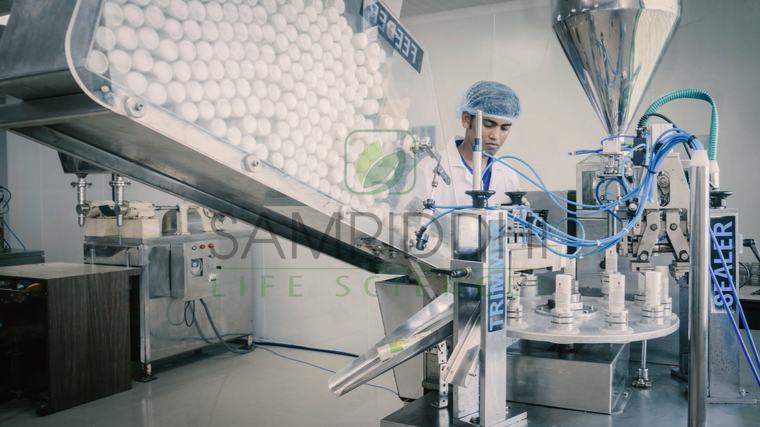 Automatic tube filling and sealing machine